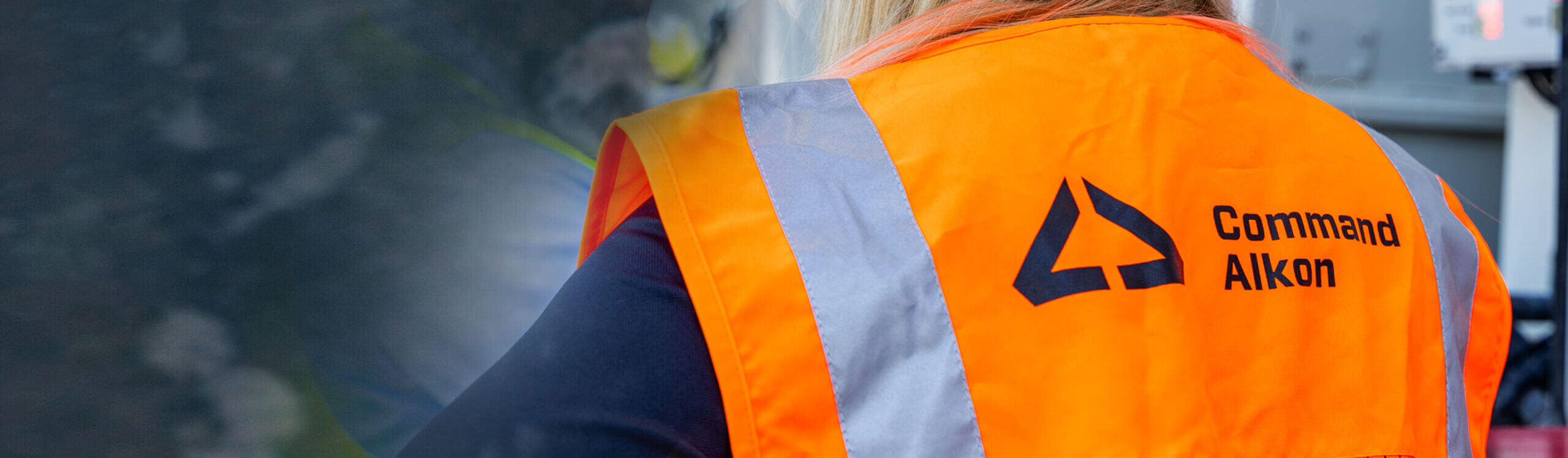 ca-hero-about back of high vis vest with command alton logo on it